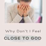 Woman holding her head in her hands wondering why don't I feel close to God?
